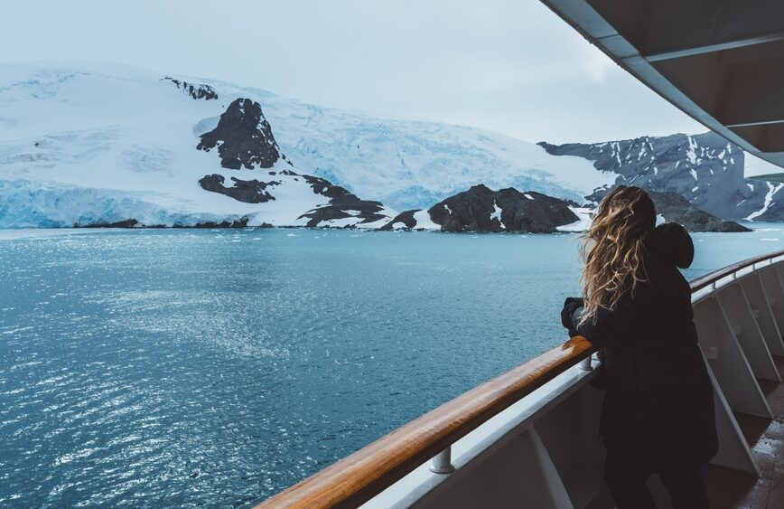 Antarctica,Cruise,Passenger,Views,Glacier.,Beautiful,Girl,Hair,Blowing,In